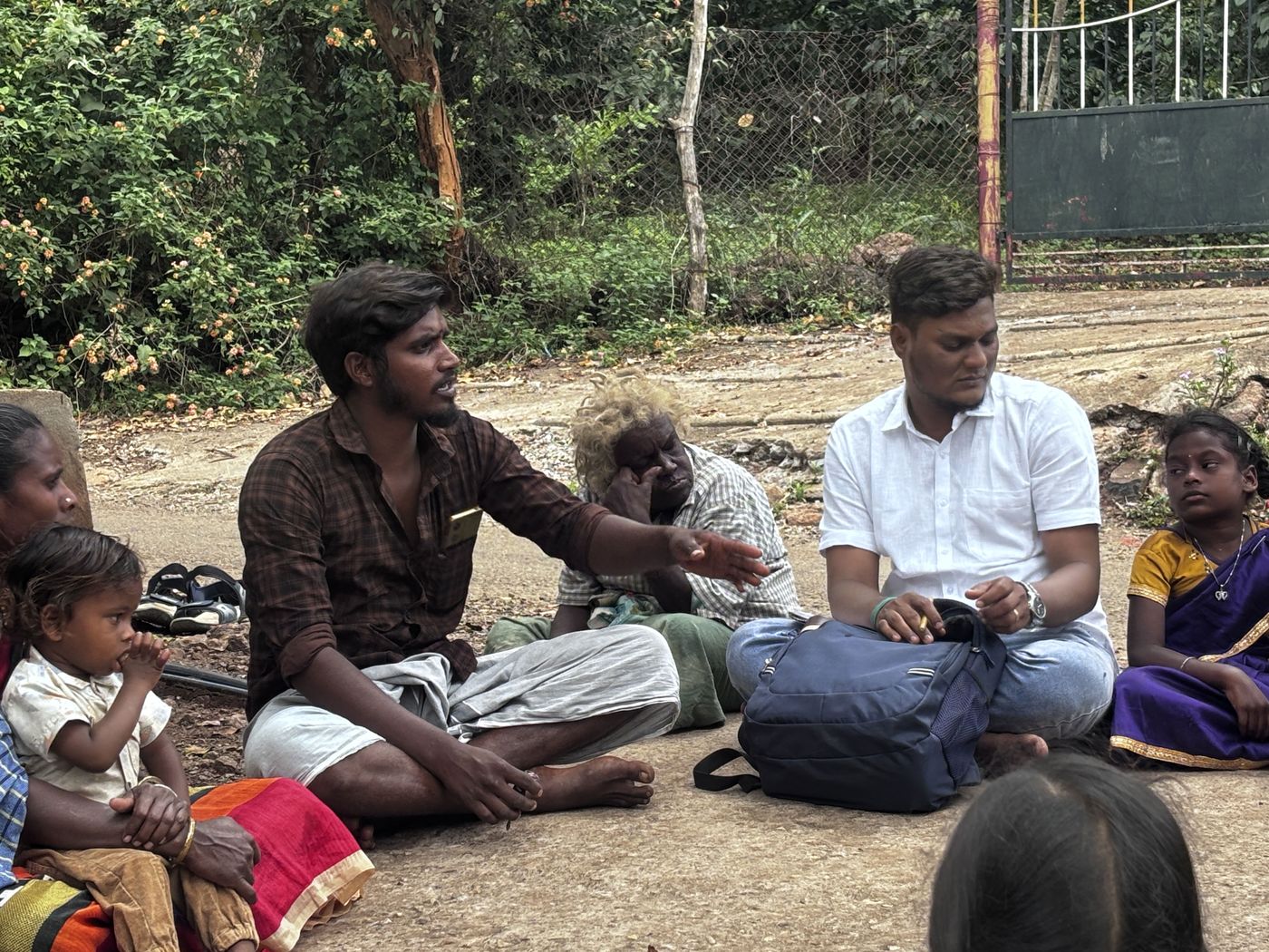 Community meeting with Paliyar families