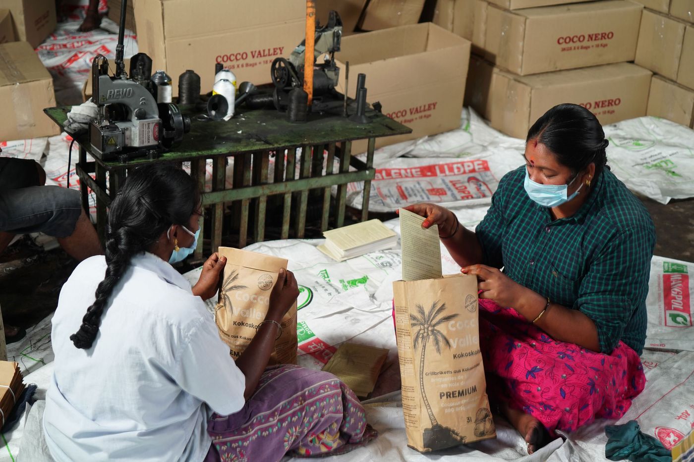 Women packing products for sale